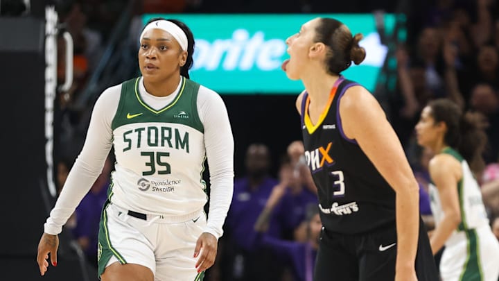 Phoenix Mercury guard Diana Taurasi (3) sticks her tongue out at Seattle Storm guard Victoria Vivians (35) after hitting a three-pointer on Sept. 19, 2024 at Footprint Center in Phoenix.