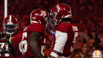 Jam Miller and Germie Bernard celebrate