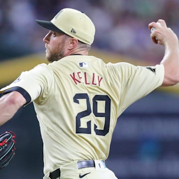 Arizona Diamondbacks pitcher Merrill Kelly (29) delivers a pitch at Chase Field on Aug. 31, 2024, in Phoenix.