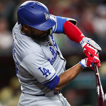 Los Angeles Dodgers outfielder Teoscar Hernandez (37) hits a ball on Aug. 30, 2024 at Chase Field in Phoenix.