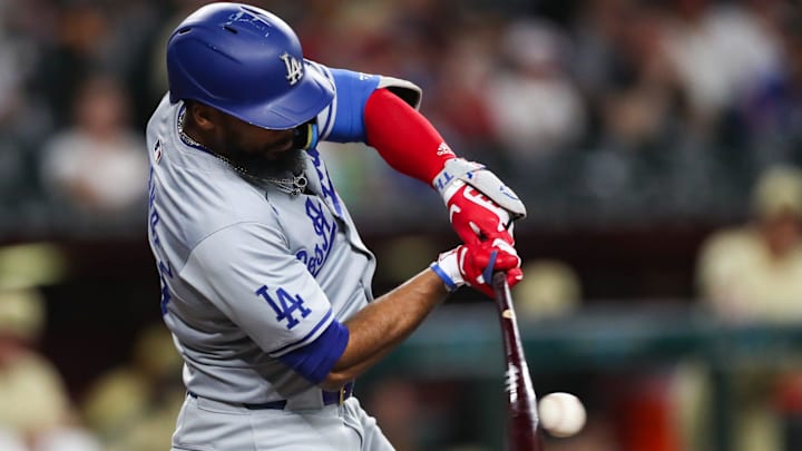 Los Angeles Dodgers outfielder Teoscar Hernandez (37) hits a ball on Aug. 30, 2024 at Chase Field in Phoenix.