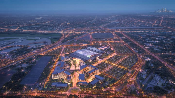 Above shot of Cleveland Browns' dome in Brook Park with city ahead in the distance. 