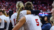 Andi Jackson (15) and Rebekah Allick (5) hug following their Final Four berth. 