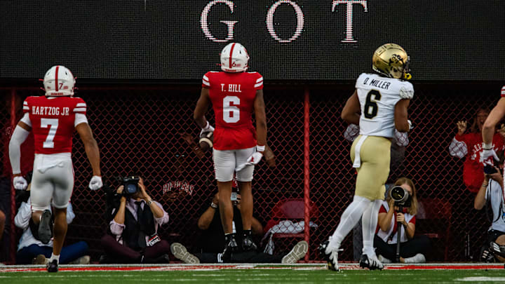 Tommi Hill (6) celebrates in the endzone after a pick six. 