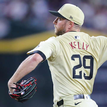 Arizona Diamondbacks pitcher Merrill Kelly (29) delivers a pitch at Chase Field on Aug. 31, 2024, in Phoenix.