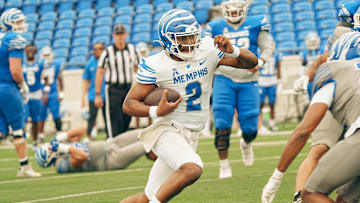 Quarterback Brendon Lewis (2) rushes with the ball during a Memphis Tigers football spring game between the blue and gray team on Saturday, April 26, 2025 at Simmons Liberty Bank Stadium in Memphis, Tenn.
