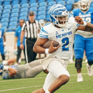 Quarterback Brendon Lewis (2) rushes with the ball during a Memphis Tigers football spring game between the blue and gray team on Saturday, April 26, 2025 at Simmons Liberty Bank Stadium in Memphis, Tenn.