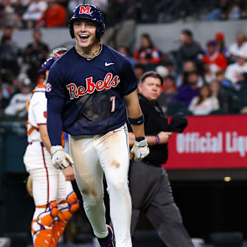 Ole Miss infielder Luke Hill reacts after hitting a home run against Clemson in the Shriners Children's College Showdown in Arlington, Texas.