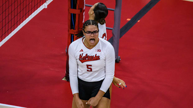 Nebraska Volleyball Rebekah Allick celebrates a double block with Merritt Beason.  