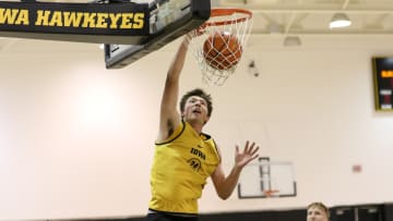 Iowa's Pryce Sandfort dunks during practice on July 15, 2024 at Carver-Hawkeye Arena in Iowa City, Iowa. (Rob Howe/HN) 