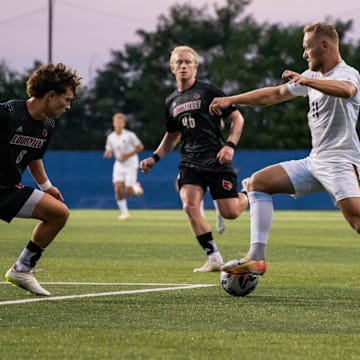 Pitt Men's Soccer forward Casper Grening dribbles in the 3-2 win vs. Louisville 