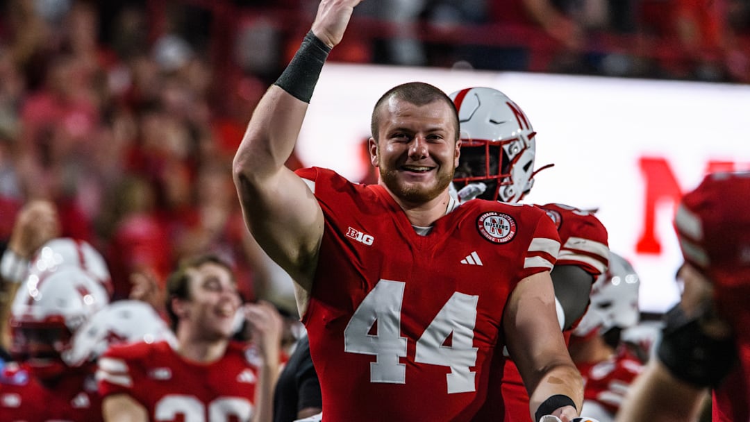 Defensive lineman Riley Van Poppel celebrates a fumble recovery against Illinois earlier this season. He can play in one more regular-season game as a redshirt. 