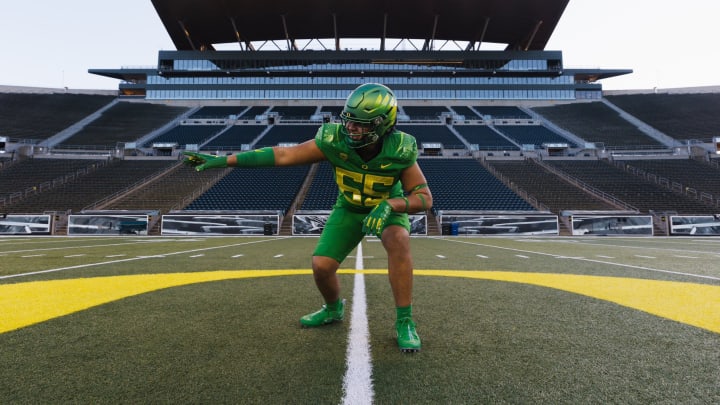 2026 four-star offensive tackle Kodi Greene wears an Oregon Ducks uniform during a visit to Eugene.