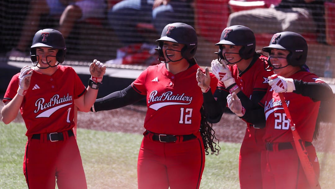 Texas Tech players, from left, Logan Halleman, Jasmyn Burns, Makayla Garcia and Angelyna Conde wait to greet Lauren Allred after a home run against Texas A&M-Corpus Christi during a Division I non-conference softball game, Sunday, March 1, 2026, at Rocky Johnson Field.