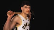 Omer Mayer with Purdue basketball 