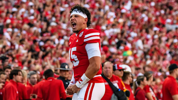 Quarterback Dylan Raiola shouts toward the Memorial Stadium crowd before kickoff against Colorado. 