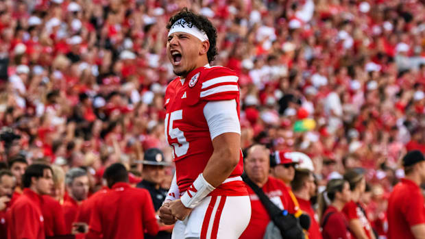 Quarterback Dylan Raiola shouts toward the Memorial Stadium crowd before kickoff against Colorado. 