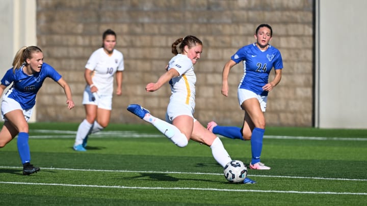 Pitt Women's Soccer senior midfielder Ellie Coffield takes a shot in the 2-1 loss to Buffalo in the 2024 home opener.