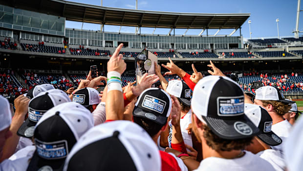 Nebraska hoists the championship trophy for the second year in a row. 