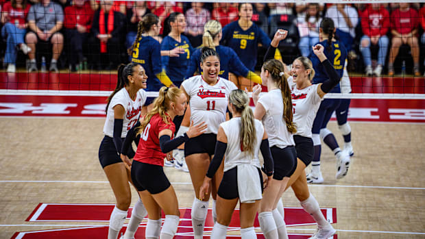 Teraya Sigler (11) celebrates a Husker kill. 