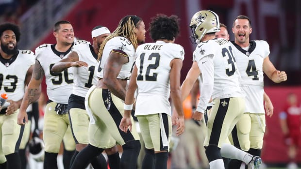 Saints celebrate a game-winning field goal from Charlie Smyth.