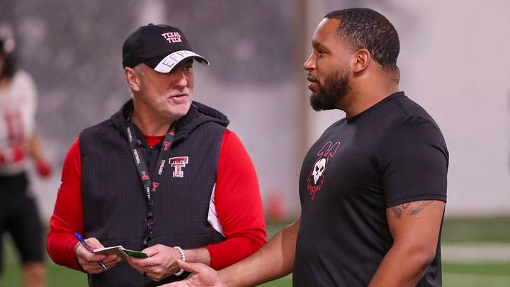 Texas Tech general manager James Blanchard speaks with head coach Joey McGuire during spring practice, Tuesday, April 1, 2025, at the Womble Football Center.