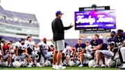 Head coach Sonny Dykes speaks to the players after a spring scrimmage.