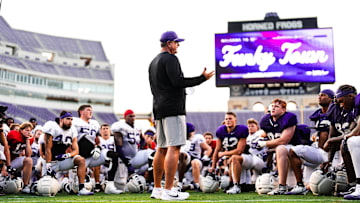 Head coach Sonny Dykes speaks to the players after a spring scrimmage.