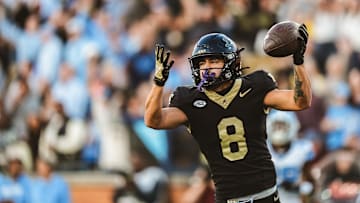 Nov 15, 2025; Winston-Salem, North Carolina, USA; Wake Forest Demon Deacons wide receiver Carlos Hernandez (8) reacts after a play against the North Carolina Tar Heels at Allegacy Federal Credit Union Stadium. Mandatory Credit: Wake Forest Athletics via Imagn Images