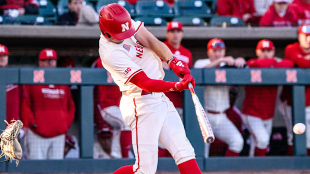 Dylan Carey hits a single to lead off the bottom of the third inning. 