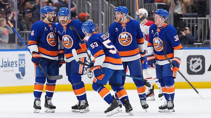 Apr 12, 2026; Elmont, New York, USA; New York Islanders center Casey Cizikas (53) celebrates a goal with defenseman Ryan Pulock (6), defenseman Scott Mayfield (24), center Marc Gatcomb (16) and center Kyle MacLean (32) against the Montreal Canadiens in the third period at UBS Arena. Mandatory Credit: Alexander Wohl-Imagn Images