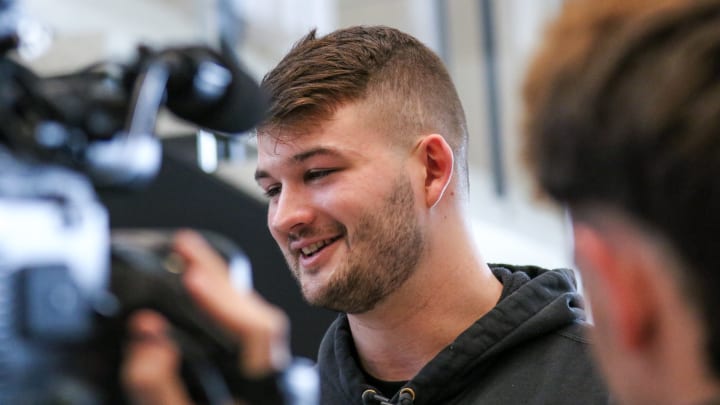 Iowa TE Luke Lachey talks with reporters in April of 2024 at the team's facility in Iowa City. (Photo: Rob Howe/HN) 