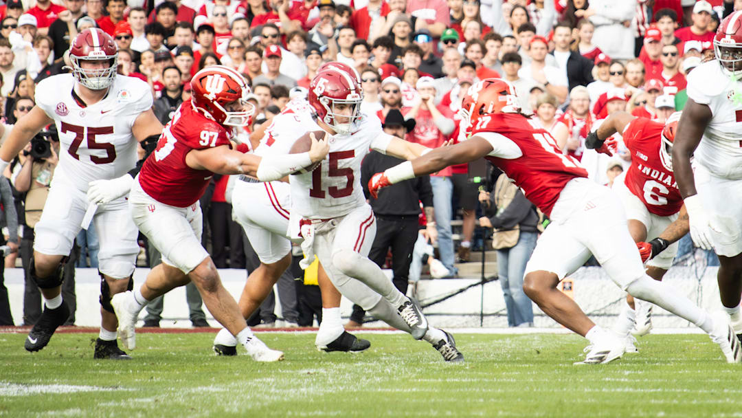 Alabama quarterback Ty Simpson hits the Heisman pose to avoid a tackle in the first half of the Rose Bowl on Jan. 1, 2026.
