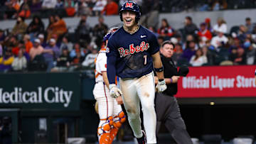 Ole Miss infielder Luke Hill reacts after hitting a home run against Clemson in the Shriners Children's College Showdown in Arlington, Texas.