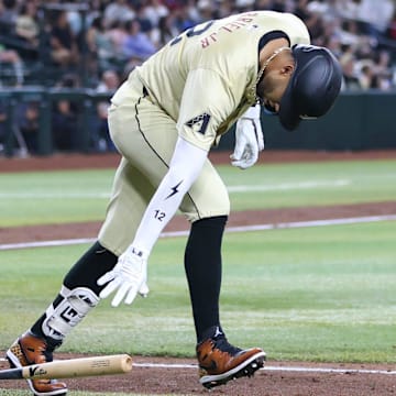 Arizona Diamondbacks outfielder Lourdes Gurriel Jr. (12) lays his bat down after hitting a solo home run at Chase Field on Aug. 31, 2024, in Phoenix.