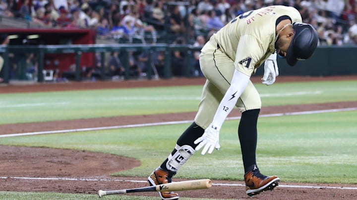 Arizona Diamondbacks outfielder Lourdes Gurriel Jr. (12) lays his bat down after hitting a solo home run at Chase Field on Aug. 31, 2024, in Phoenix.