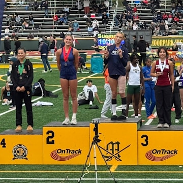Jurupa Valley's AB Hernandez, a transgender student-athlete, stands atop the winner's podium at the CIF Southern Section finals after winning the triple jump.