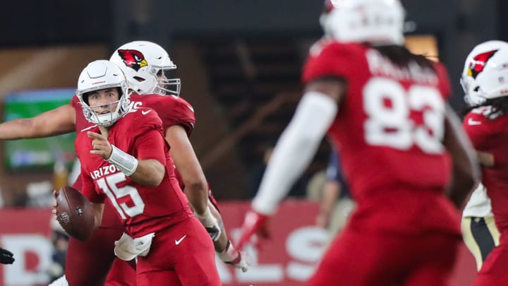 Arizona Cardinals quarterback Desmond Ridder (15) points downfield while scrambling during a preseason game on Aug. 10, 2024, at State Farm Stadium in Glendale.