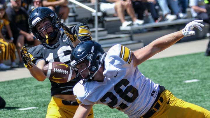 Iowa's Kael Kolarik breaks of a pass intended for Reece Vander Zee at practice on Aug. 10, 2024 in Iowa City. (Rob Howe/HN) 