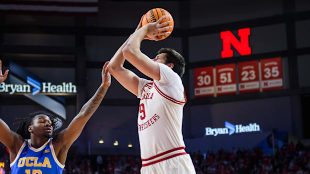 Berke Büyüktuncel (9) attempts a long two-point shot in the first half. 