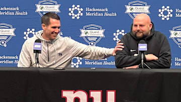 Giants general manager Joe Schoen jokes with head coach Brian Daboll during Monday's end-of-season joint news conference. 
