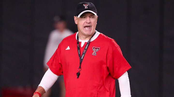 Head coach Joey McGuire walks the field during Texas Tech football practice, Monday, August 11, 2025, at the Womble Football Center.
