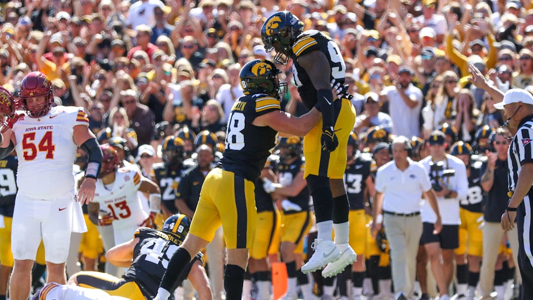 Iowa DL Max Llewellyn (left), Brian Allen. (Rob Howe/HN) Iowa DL Max Llewellyn (left), Brian Allen. (Rob Howe/HN)