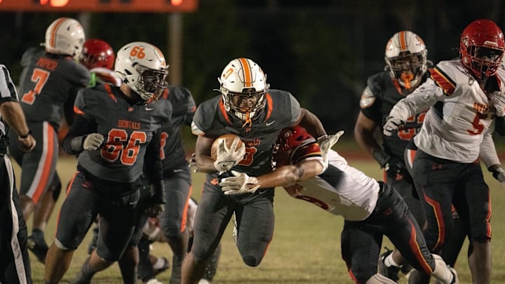 Piper High's Jahnard Young rushed 33 times for 140 yards and two touchdowns to power the Bengals past Pembroke Pines Flanagan, 24-12, in a Class 6A, Region 4 quarterfinal game on Nov. 14, 2025.