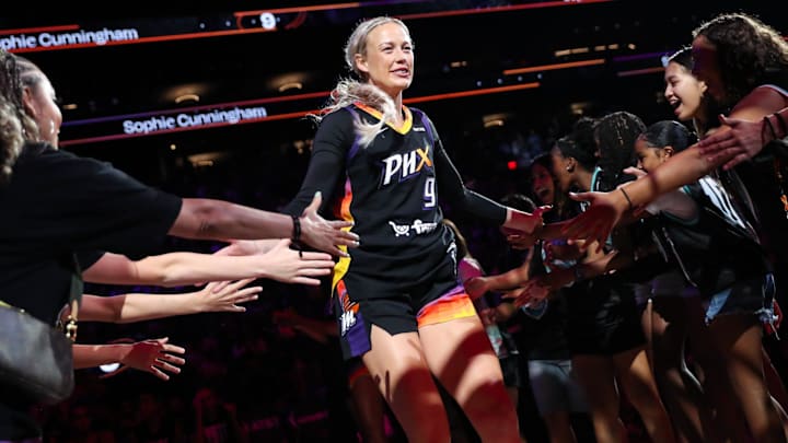 Phoenix Mercury guard Sophie Cunningham (9) is introduced before the game 