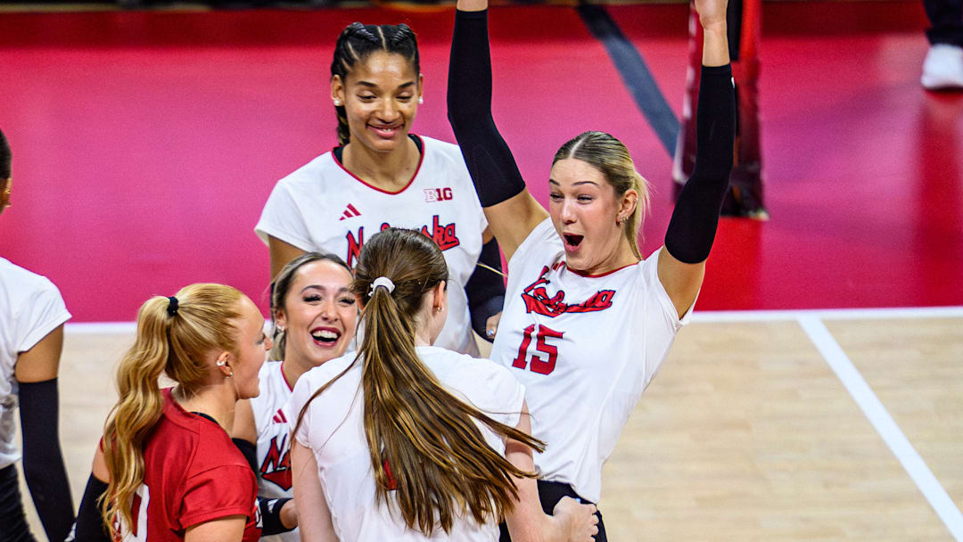The Huskers celebrate a tip from Bergen Reilly in Wednesday's win over Michigan