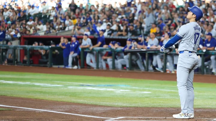 Los Angeles Dodgers designated hitter Shohei Ohtani (17) watches his solo home run fly on Aug 31, 2024 at Chase Field in Phoenix.