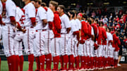 The Huskers stand for the National Anthem prior to their first game of the Big Ten Tournament. 
