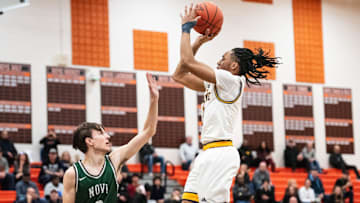 Wayne Memorial's Carlos Medlock Jr. shoots during the Kensington Lakes Activities Association boys basketball championship on Friday, Feb. 21, 2025, at Northville High School.