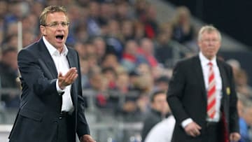 Schalke's head coach Ralf Rangnick (L) g